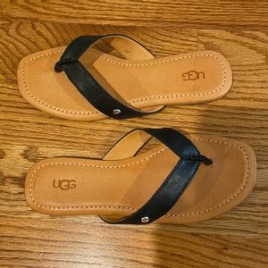 Ugg, tan and black flip flops